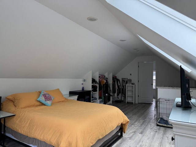 14 Russell St, Hamden, CT 06517 - bedroom featuring light wood-type flooring and lofted ceiling