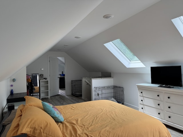 14 Russell St, Hamden, CT 06517 - bedroom featuring a skylight, lofted ceiling, and wood finished floors