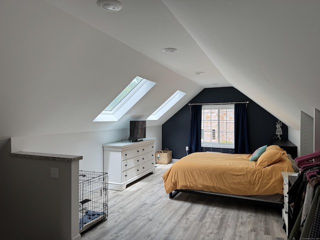 14 Russell St, Hamden, CT 06517 - bedroom featuring a skylight, wood finished floors, and vaulted ceiling