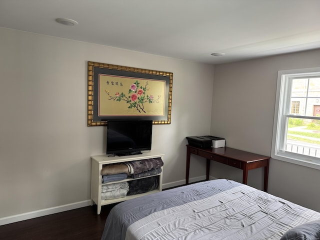 14 Russell St, Hamden, CT 06517 - bedroom with dark wood-style flooring and baseboards