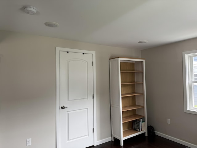 14 Russell St, Hamden, CT 06517 - unfurnished bedroom featuring baseboards and dark wood-style flooring