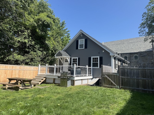 14 Russell St, Hamden, CT 06517 - rear view of property featuring a deck and a gate