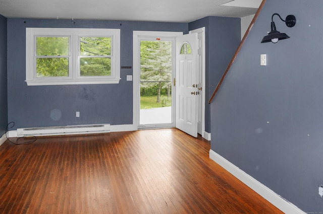 3 Fielding Dr, Montville, CT 06382 - entrance foyer featuring baseboard heating, baseboards, and hardwood / wood-style flooring