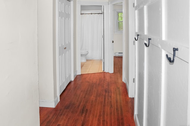 3 Fielding Dr, Montville, CT 06382 - hall with baseboard heating, wood finished floors, and baseboards