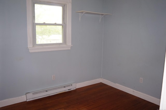 3 Fielding Dr, Montville, CT 06382 - spare room with baseboard heating, baseboards, and dark wood-style flooring