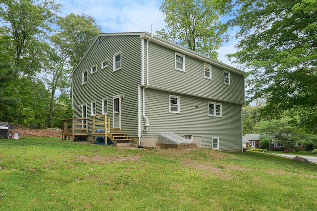 3 Fielding Dr, Montville, CT 06382 - rear view of house featuring a yard and a deck