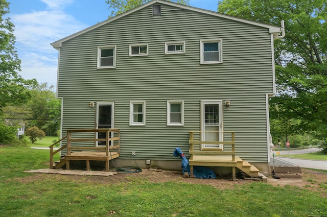 3 Fielding Dr, Montville, CT 06382 - rear view of house with a lawn