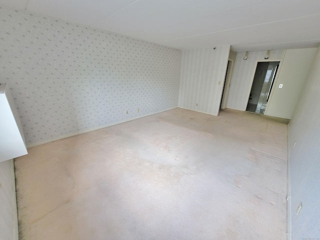 143 Hoyt St Apt 1F, Stamford, CT 06905 - empty room featuring wallpapered walls