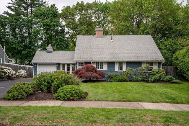 16 Fairfield Rd, West Hartford, CT 06117 - view of front of home featuring a shingled roof and a chimney
