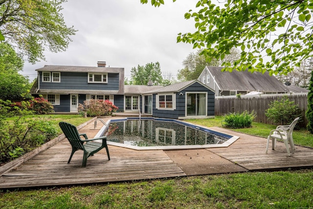 16 Fairfield Rd, West Hartford, CT 06117 - rear view of property with a deck and a chimney