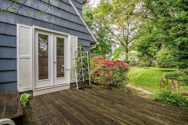 deck featuring a lawn