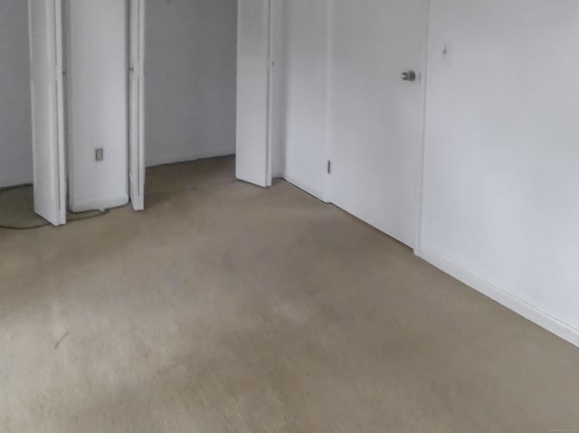 unfurnished bedroom featuring carpet flooring