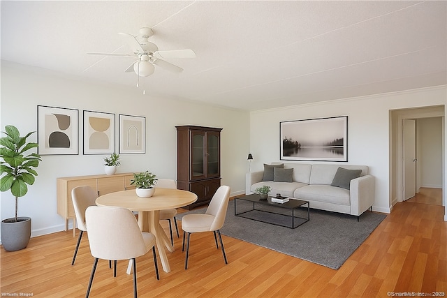 60 Strawberry Hill Ave Unit 1118, Stamford, CT 06902 - dining room featuring light wood finished floors, ceiling fan, and baseboards
