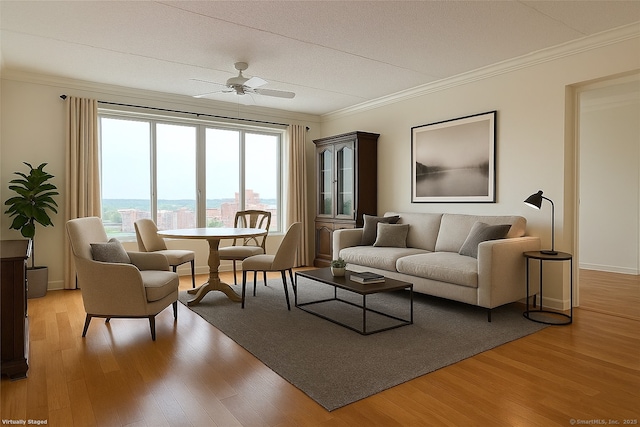 60 Strawberry Hill Ave Unit 1118, Stamford, CT 06902 - living area with light wood-style floors, crown molding, ceiling fan, and baseboards