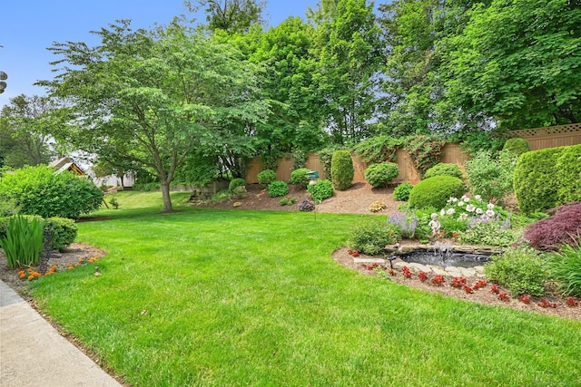 67 Matthew Dr, Stratford, CT 06614 - view of yard with a garden pond