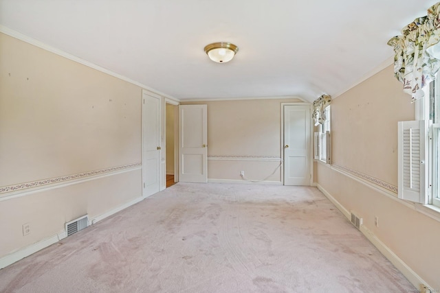 67 Matthew Dr, Stratford, CT 06614 - unfurnished room featuring carpet floors, lofted ceiling, crown molding, and baseboards