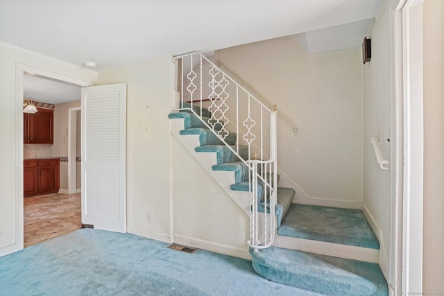 67 Matthew Dr, Stratford, CT 06614 - stairs with carpet and baseboards