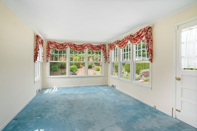 67 Matthew Dr, Stratford, CT 06614 - unfurnished sunroom featuring carpet floors, baseboards, and ornamental molding