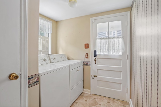 67 Matthew Dr, Stratford, CT 06614 - laundry room featuring washer and clothes dryer and baseboards