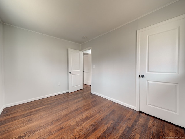 37 Austin Rd, Durham, CT 06422 - empty room featuring dark wood-type flooring, baseboards, and crown molding