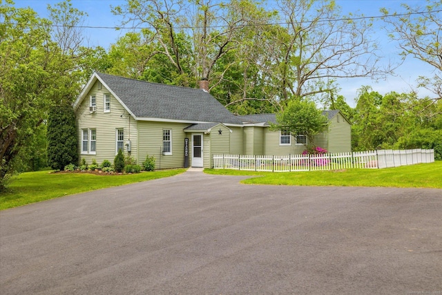 123 Kennerson Reservoir Rd, Ashford, CT 06278 - view of front of house featuring roof with shingles and a chimney