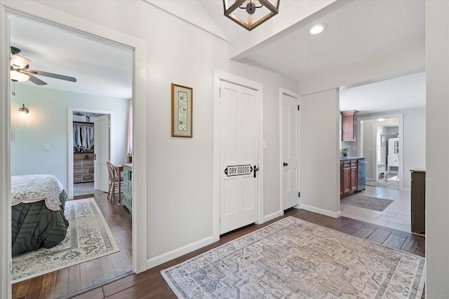 123 Kennerson Reservoir Rd, Ashford, CT 06278 - entrance foyer with ceiling fan, dark wood-style flooring, baseboards, and lofted ceiling