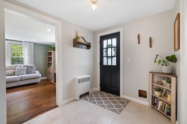 123 Kennerson Reservoir Rd, Ashford, CT 06278 - entryway with radiator, baseboards, light tile patterned floors, and recessed lighting