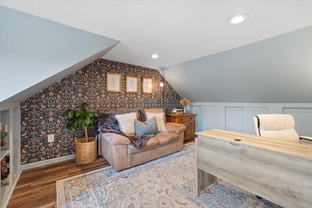 123 Kennerson Reservoir Rd, Ashford, CT 06278 - bedroom with wallpapered walls, wood finished floors, baseboards, lofted ceiling, and recessed lighting