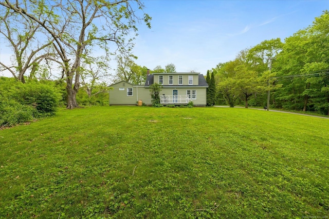 123 Kennerson Reservoir Rd, Ashford, CT 06278 - back of house featuring a yard and a deck