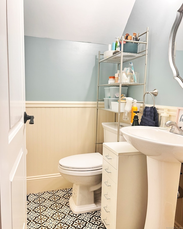 41 Secret Lake Rd, Canton, CT 06019 - half bathroom featuring wainscoting, toilet, and tile patterned floors