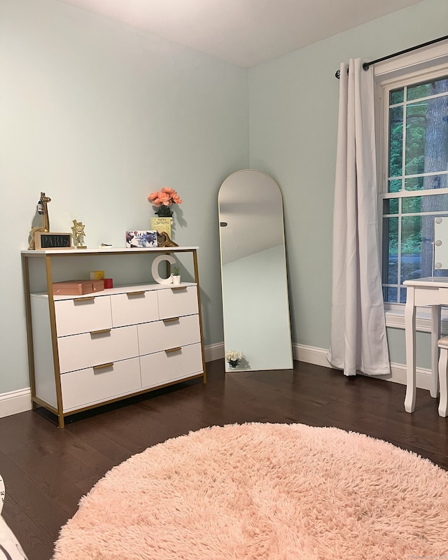 41 Secret Lake Rd, Canton, CT 06019 - bedroom with baseboards and dark wood-type flooring