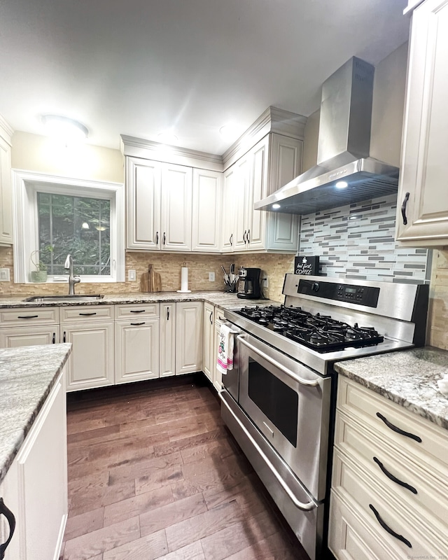 41 Secret Lake Rd, Canton, CT 06019 - kitchen featuring double oven range, wall chimney exhaust hood, a sink, dark wood finished floors, and light stone countertops