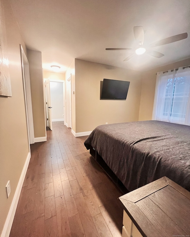 41 Secret Lake Rd, Canton, CT 06019 - bedroom featuring baseboards, hardwood / wood-style floors, and a ceiling fan