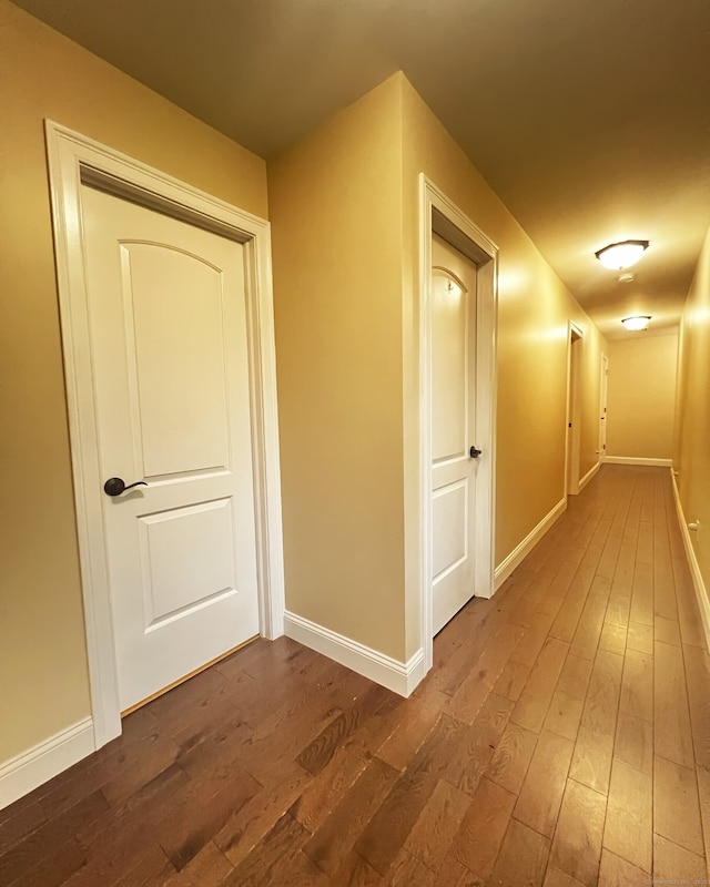 41 Secret Lake Rd, Canton, CT 06019 - corridor featuring dark wood-type flooring and baseboards