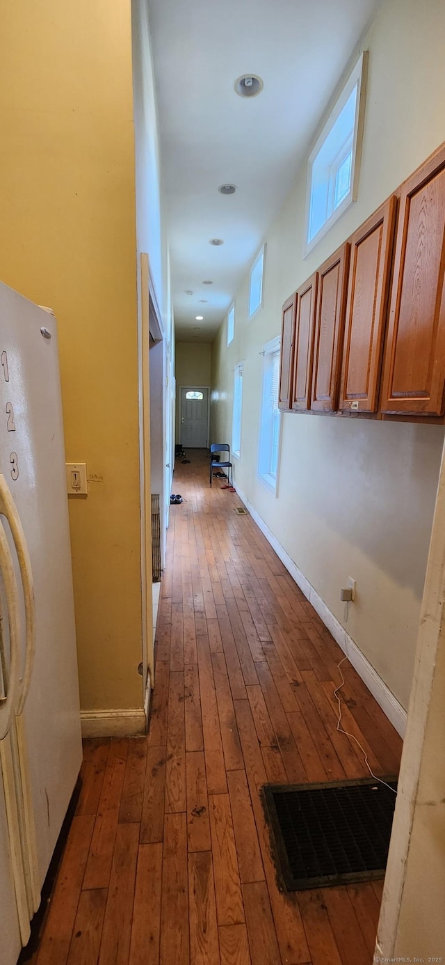 75 Clifton St, West Haven, CT 06516 - hallway with dark wood-style floors and baseboards