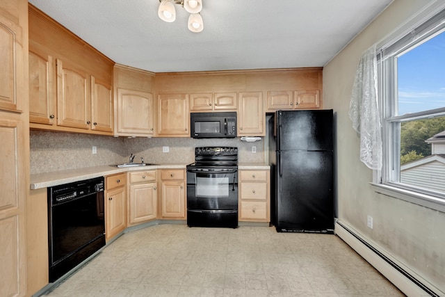 154 Williamson Dr, Waterbury, CT 06710 - kitchen featuring black appliances, a baseboard radiator, light brown cabinets, a sink, and light countertops