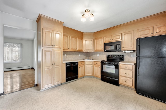 154 Williamson Dr, Waterbury, CT 06710 - kitchen with black appliances, light brown cabinets, a baseboard radiator, light countertops, and backsplash
