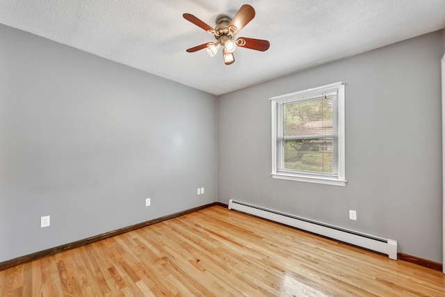 154 Williamson Dr, Waterbury, CT 06710 - unfurnished room featuring a baseboard heating unit, wood finished floors, baseboards, a ceiling fan, and a textured ceiling
