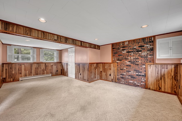 154 Williamson Dr, Waterbury, CT 06710 - unfurnished room with baseboard heating, carpet floors, a wainscoted wall, wooden walls, and recessed lighting