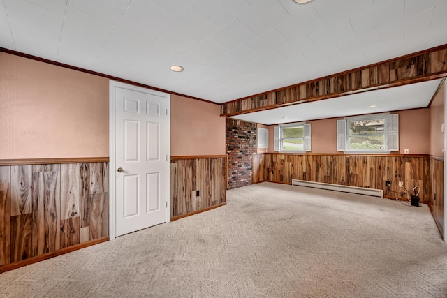 154 Williamson Dr, Waterbury, CT 06710 - carpeted empty room featuring a baseboard radiator, wood walls, a wainscoted wall, crown molding, and recessed lighting