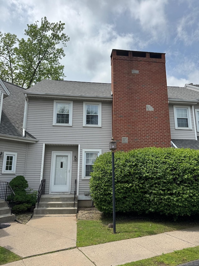222 W Main St Apt 1C, Southington, CT 06479 - view of front facade with a chimney