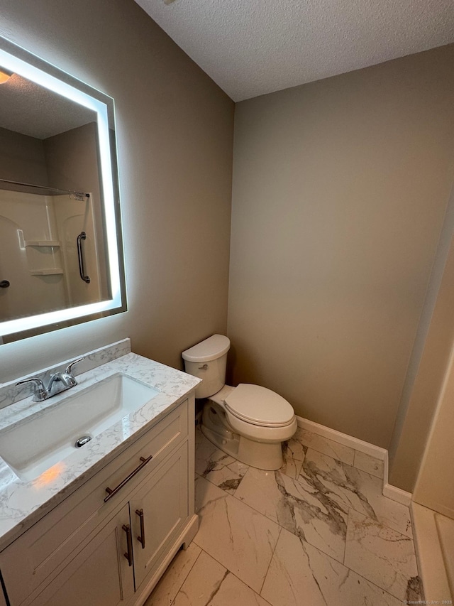 222 W Main St Apt 1C, Southington, CT 06479 - full bath featuring marble look tiles, a shower, a textured ceiling, toilet, and vanity