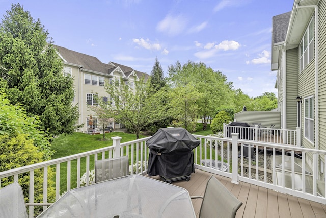 81 Tucker St Unit 81, Danbury, CT 06810 - deck featuring outdoor dining space, grilling area, and a lawn