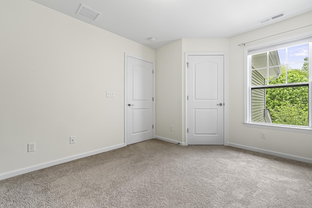 81 Tucker St Unit 81, Danbury, CT 06810 - unfurnished bedroom featuring carpet flooring and baseboards