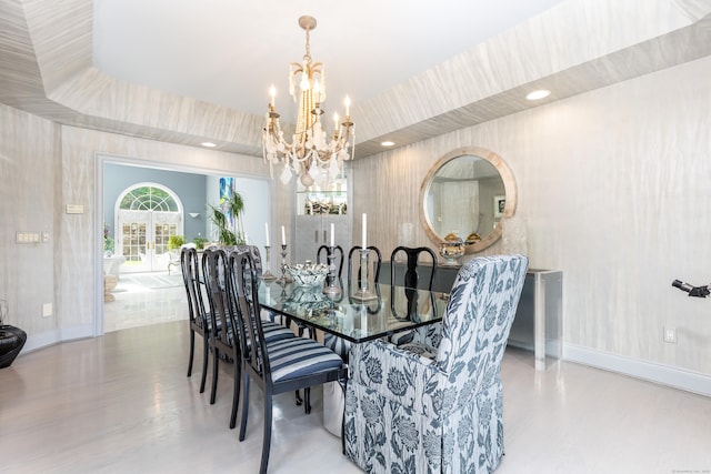dining area featuring a chandelier, wood finished floors, baseboards, and recessed lighting