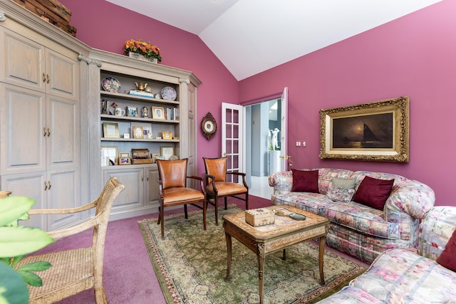 living area with vaulted ceiling and carpet flooring