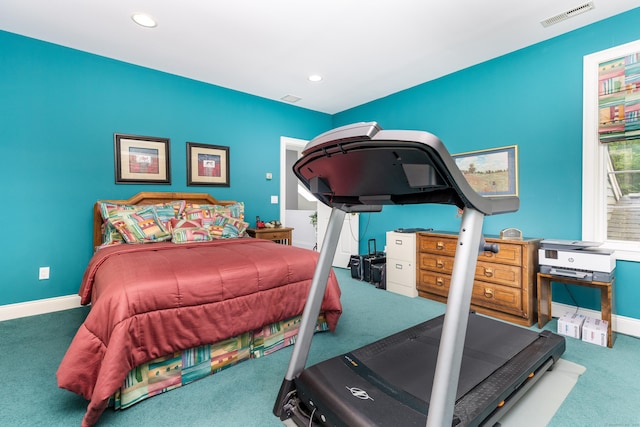 exercise area with carpet floors, recessed lighting, and baseboards