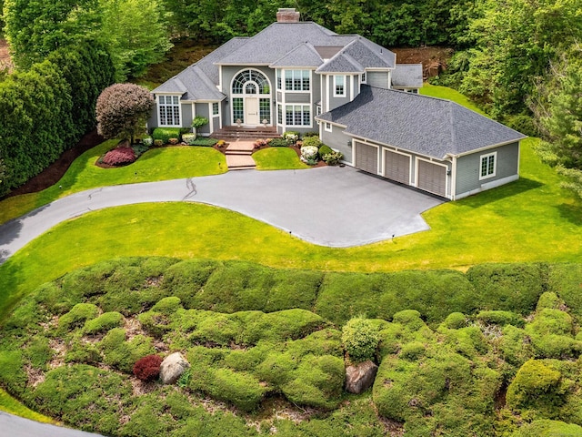 view from above of property featuring a forest
