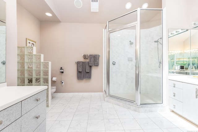 full bathroom with vanity, a shower stall, toilet, recessed lighting, and marble look tile flooring