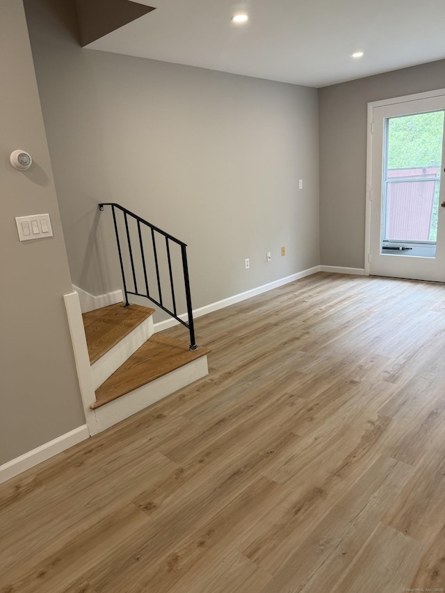 240 Centerbrook Rd Unit 240, Hamden, CT 06518 - unfurnished room with baseboards, light wood-style flooring, recessed lighting, and stairs